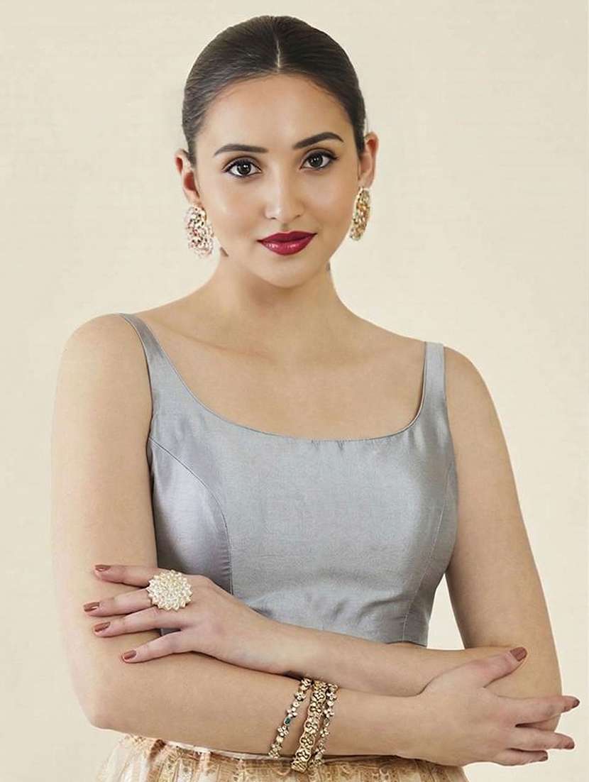 women solid sleeveless stitched blouse