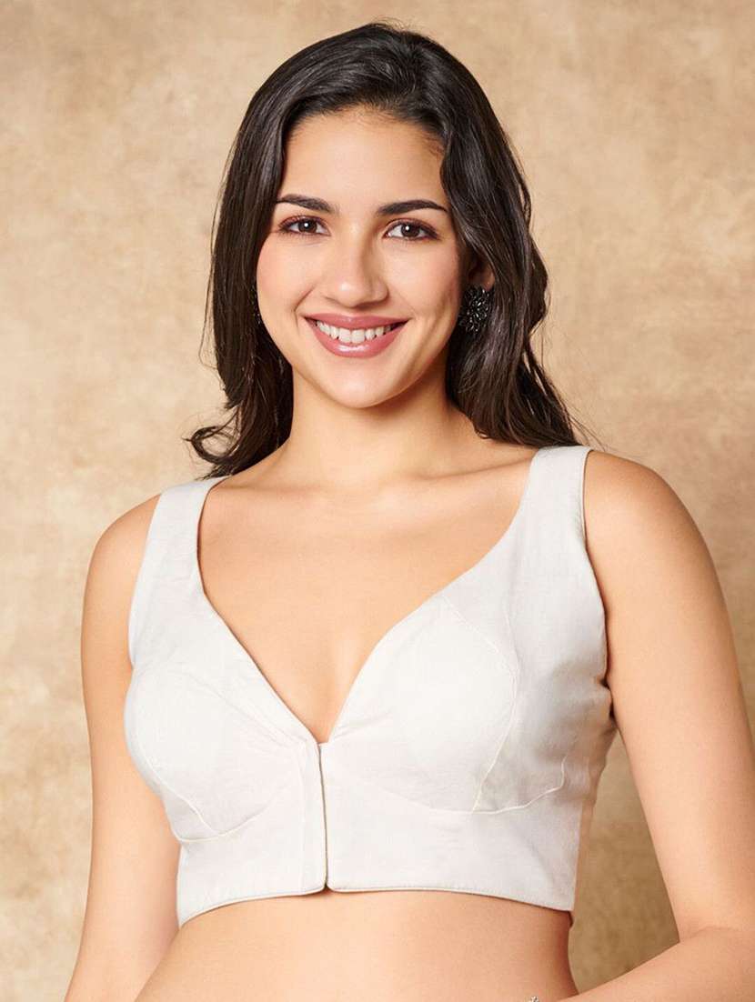 women solid sleeveless stitched blouse