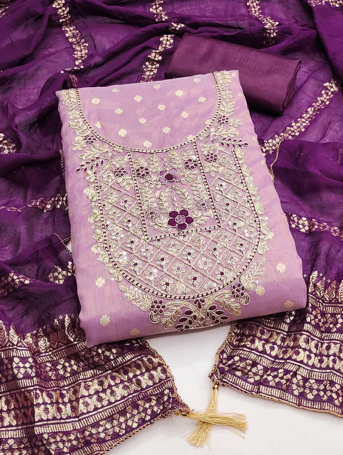 women self design unstitched suit set