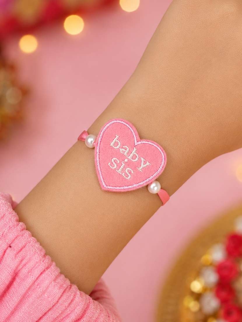 handcrafted thread rakhi with pearls