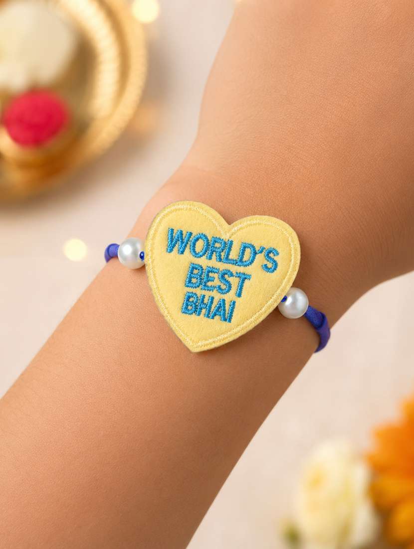 handcrafted thread rakhi with pearls