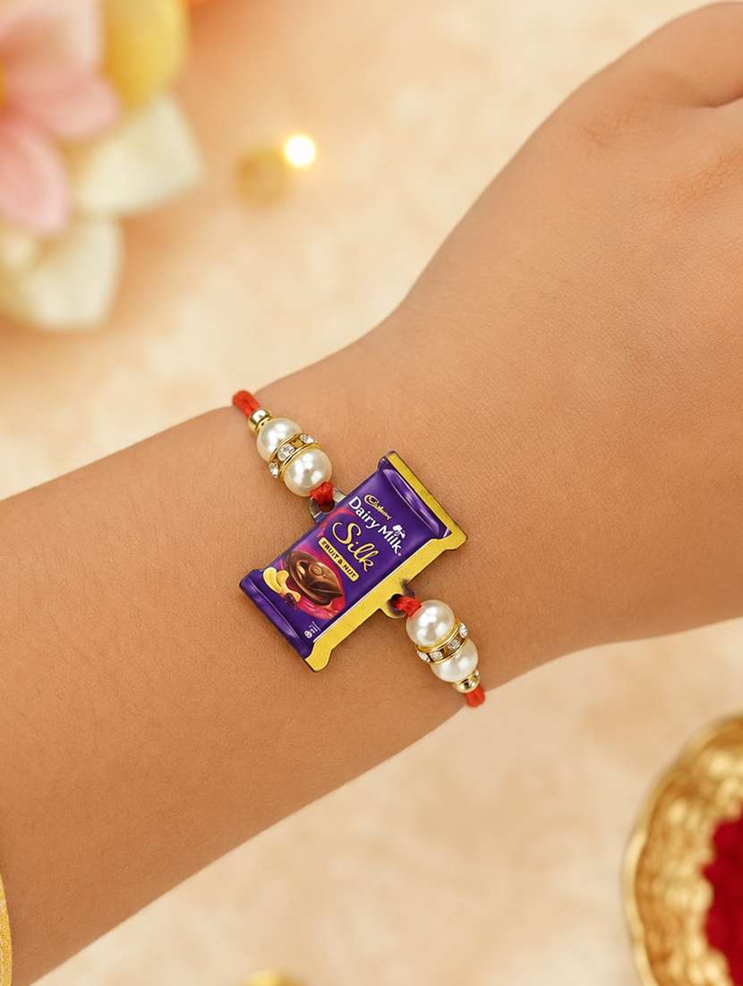 the magic wand trendy quirky dairy milk silk wooden rakhi