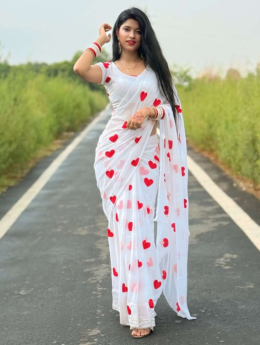 women solid with work embroidered saree with blouse