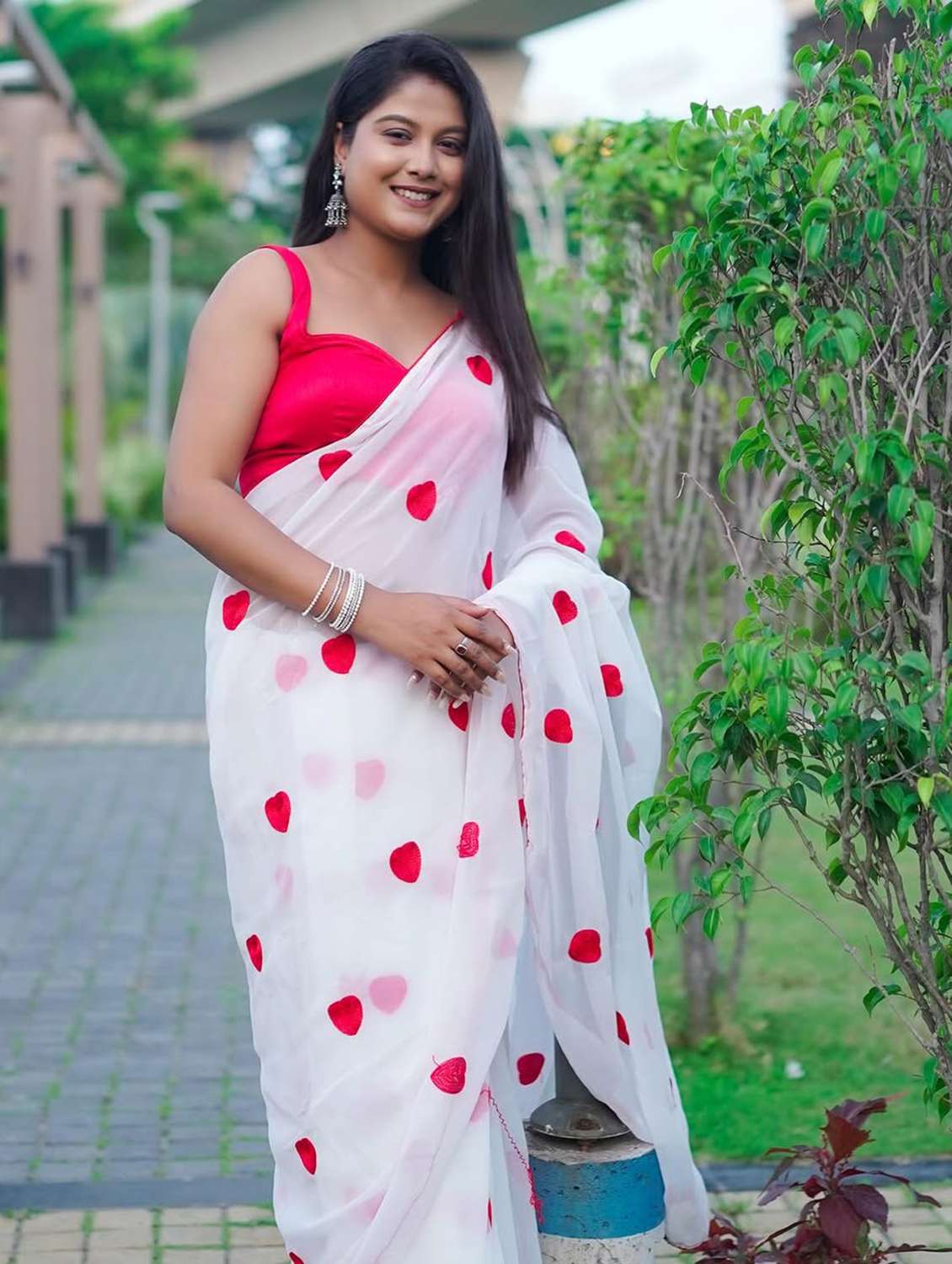women solid with work embroidered saree with blouse