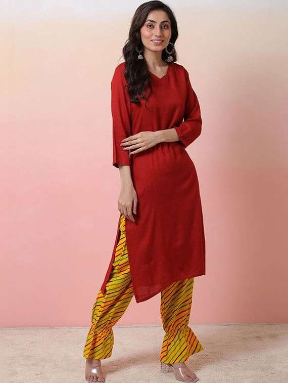 women solid three quarter sleeves kurta pant set