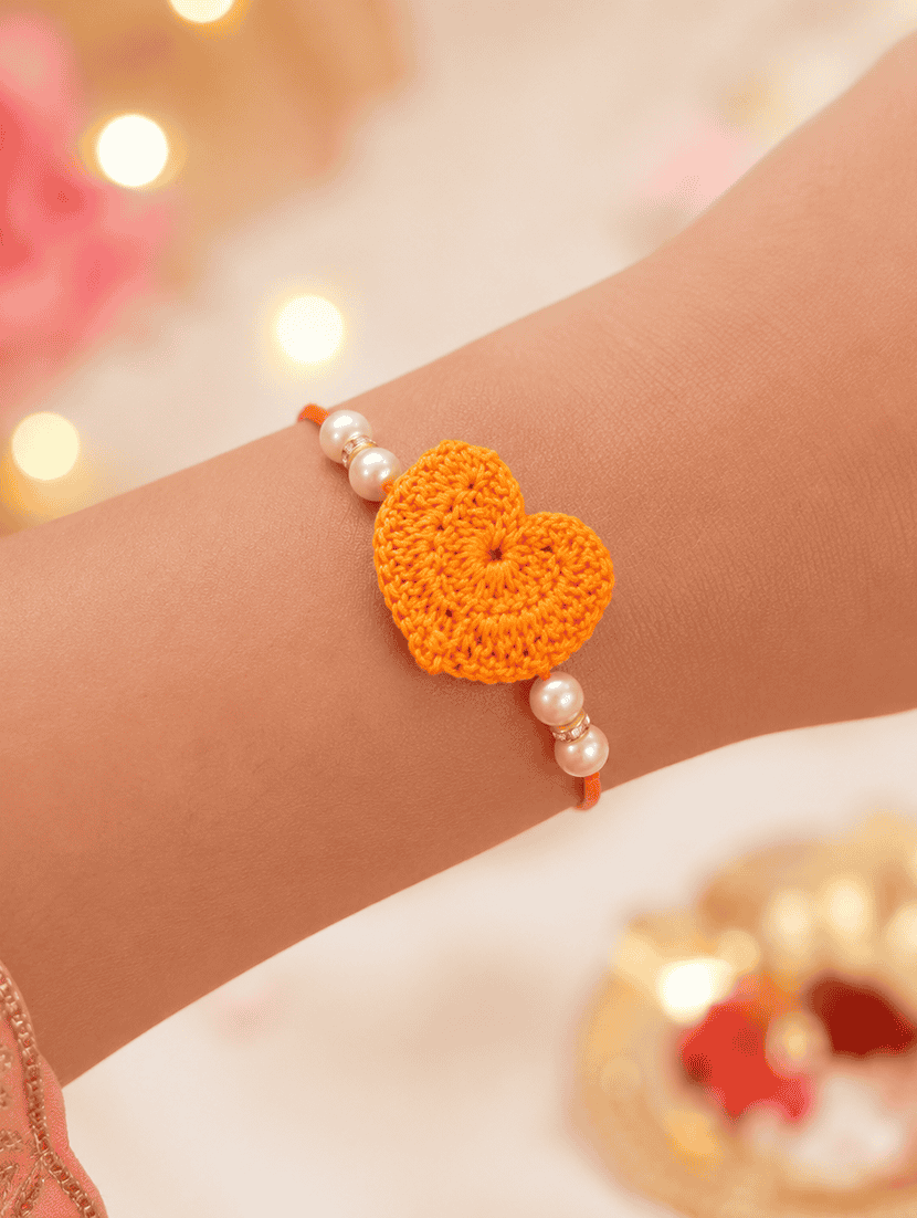 the magic wand cute heart applique pearl detailing handmade crochet rakhi