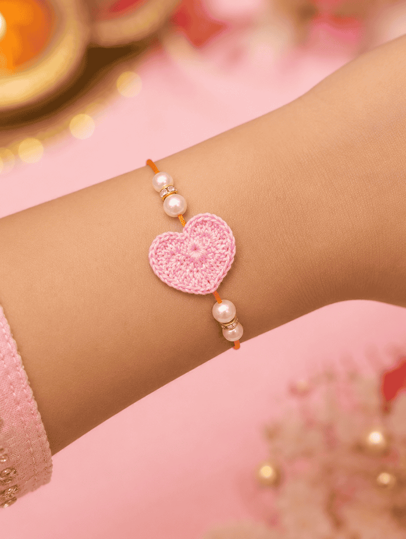 the magic wand cute heart applique pearl detailing handmade crochet rakhi