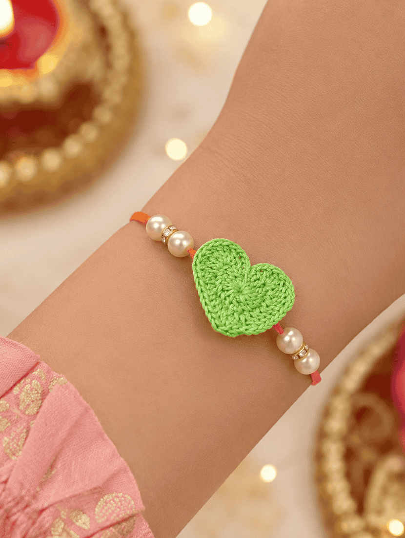 the magic wand cute heart applique pearl detailing handmade crochet rakhi