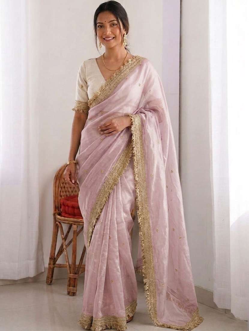 women solid with work embroidered saree with blouse