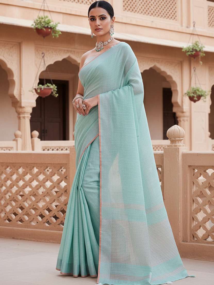 women solid bordered saree with blouse