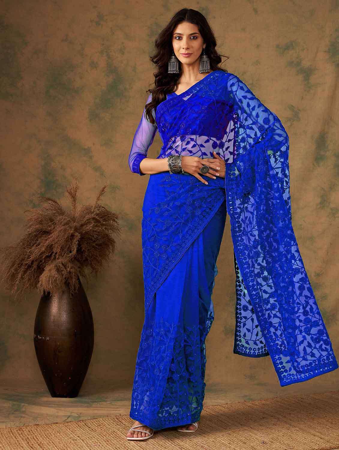 women solid with work embroidered saree with blouse
