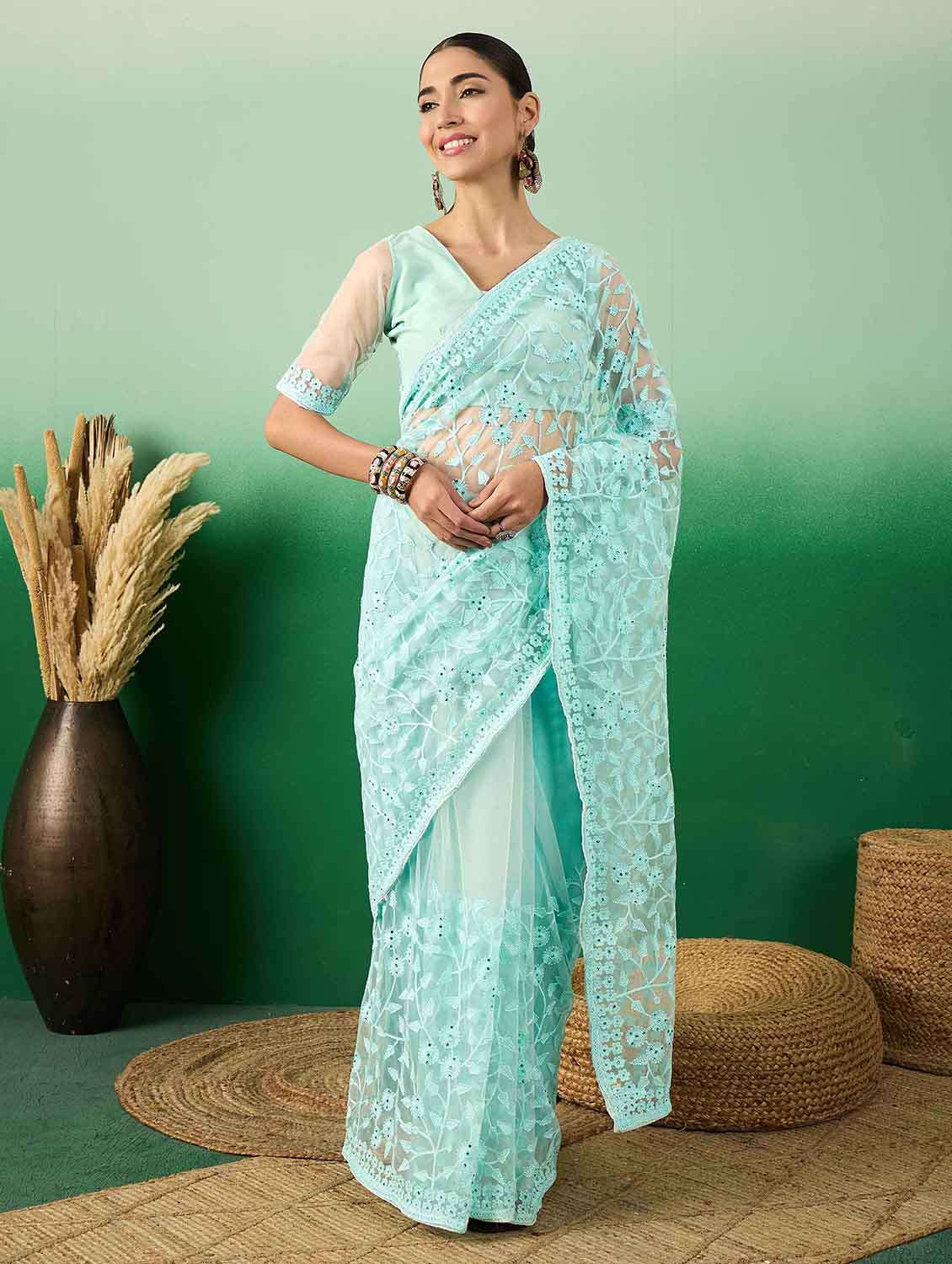 women solid with work embroidered saree with blouse