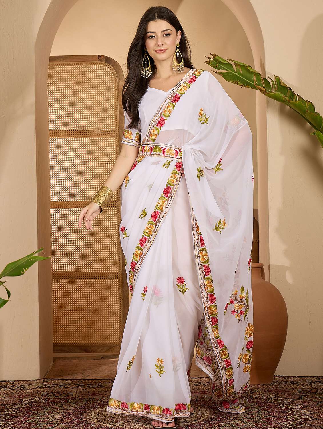 women solid with work embroidered saree with blouse