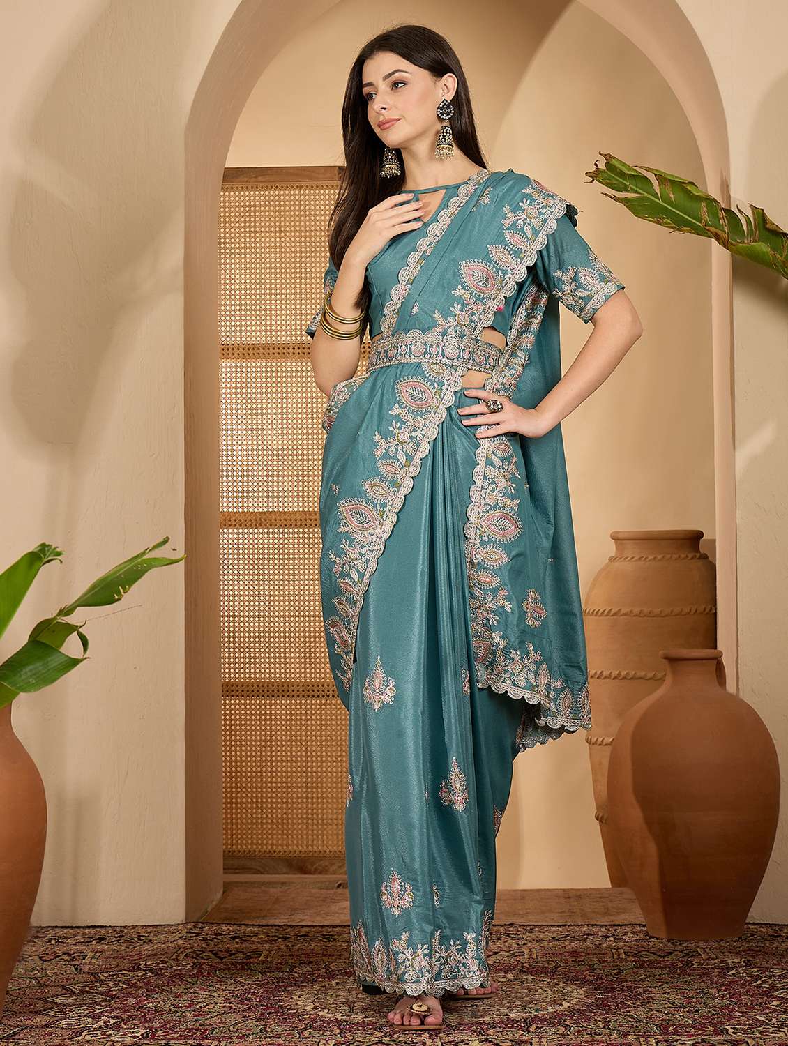 women solid with work embroidered saree with blouse