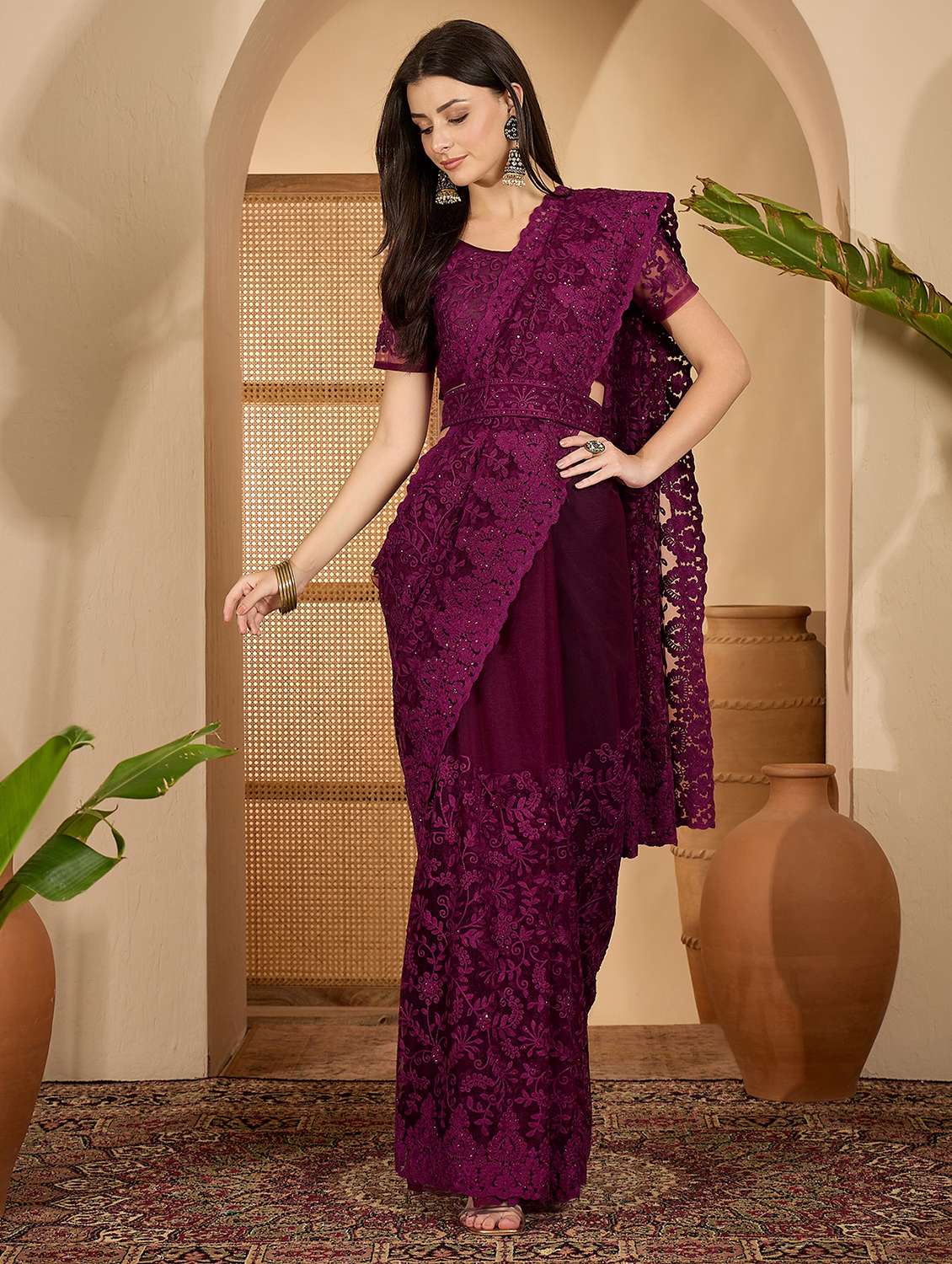 women solid with work embroidered saree with blouse