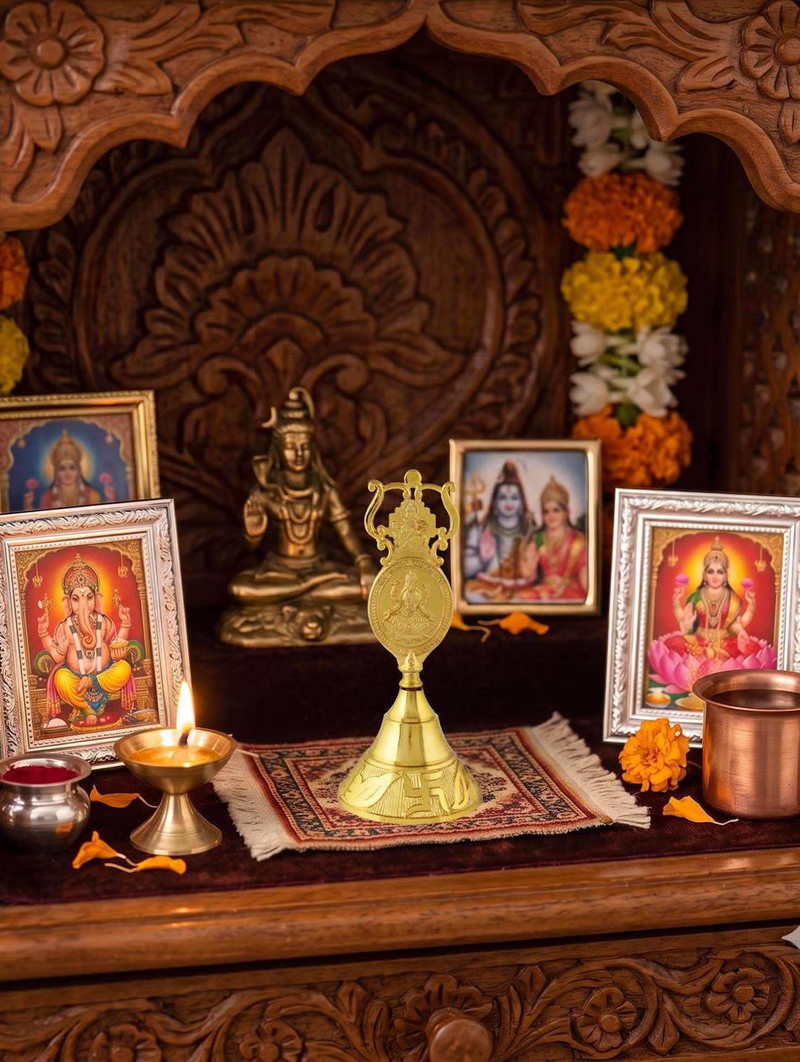 brass gold big bell with ganesh motif