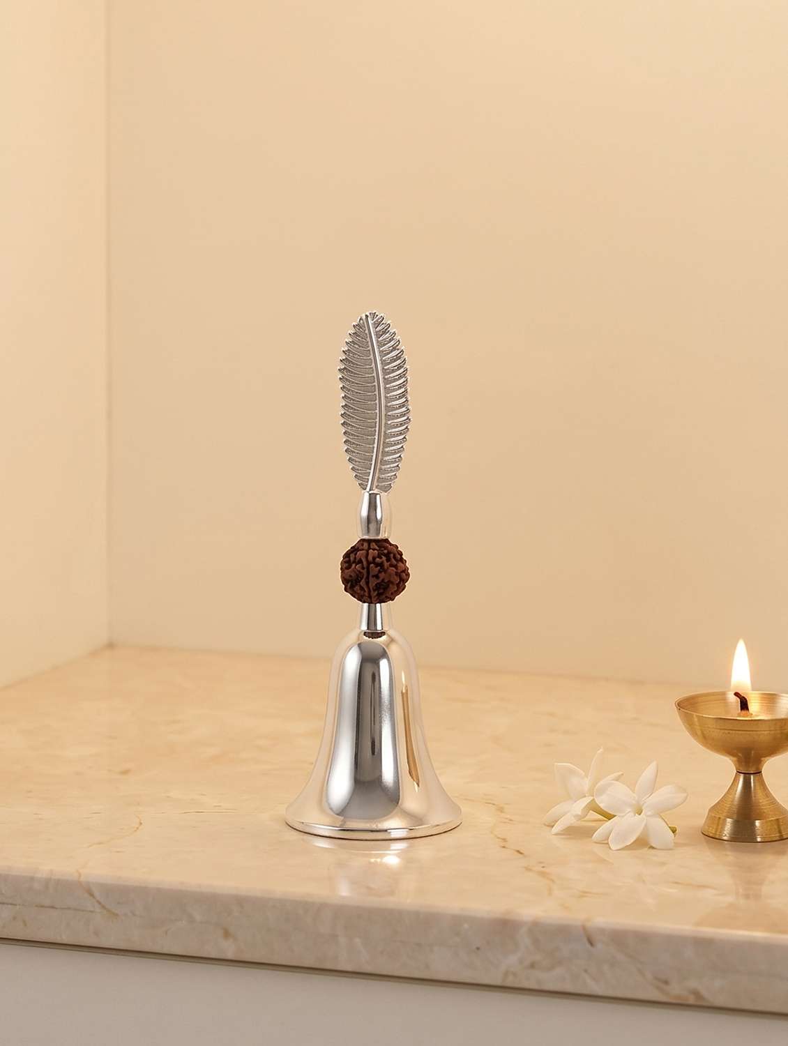 big silver plated bell with leaf and rudraksh