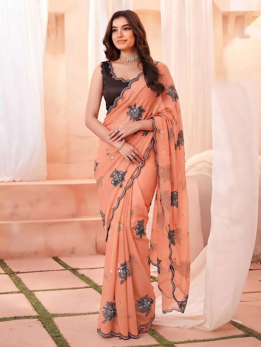 women solid with work embroidered saree with blouse