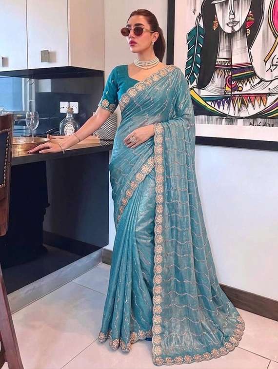 women solid with work embroidered saree with blouse