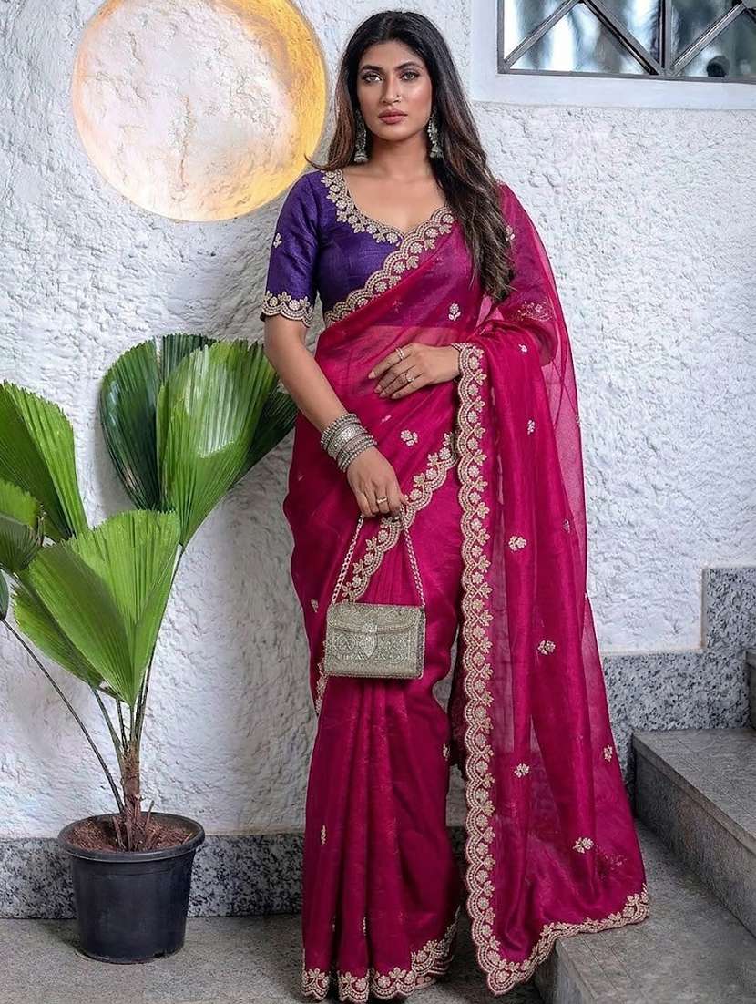 women solid with work embroidered saree with blouse