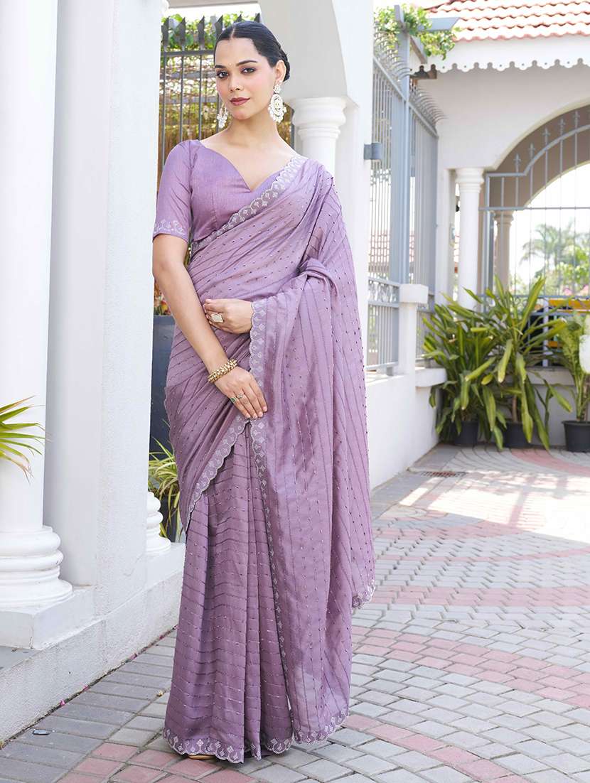 women solid with work embellished saree with blouse