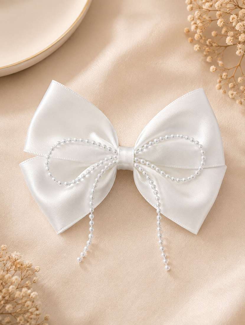 white satin bow hair clip with pearl bow design