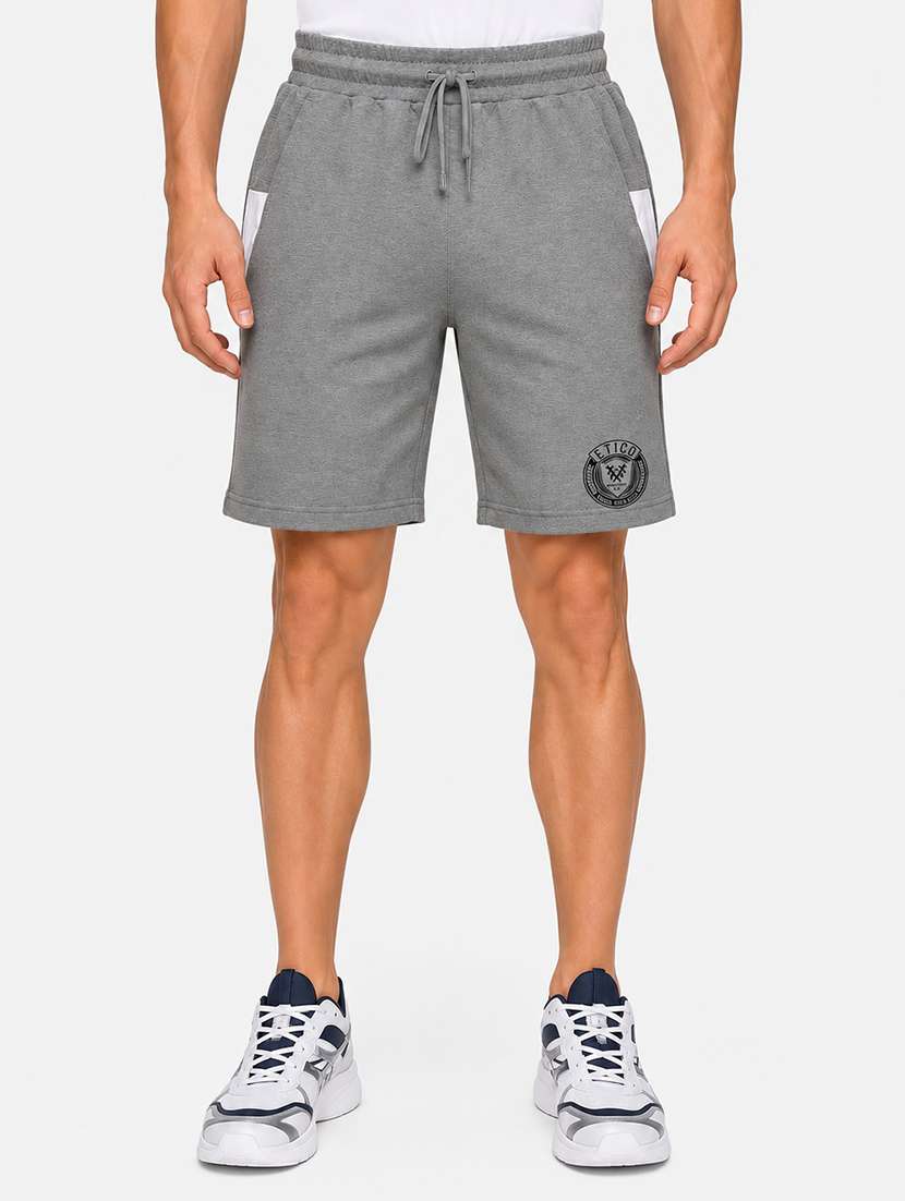 men solid mid rise regular fit shorts