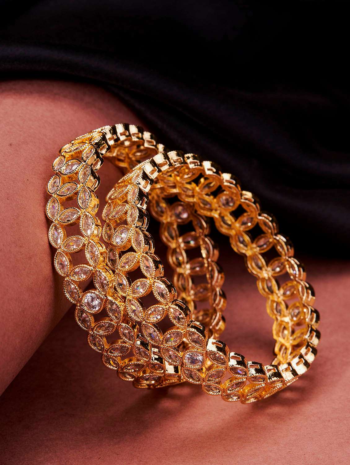 gold plated engraved oval shaped bangles with stone
