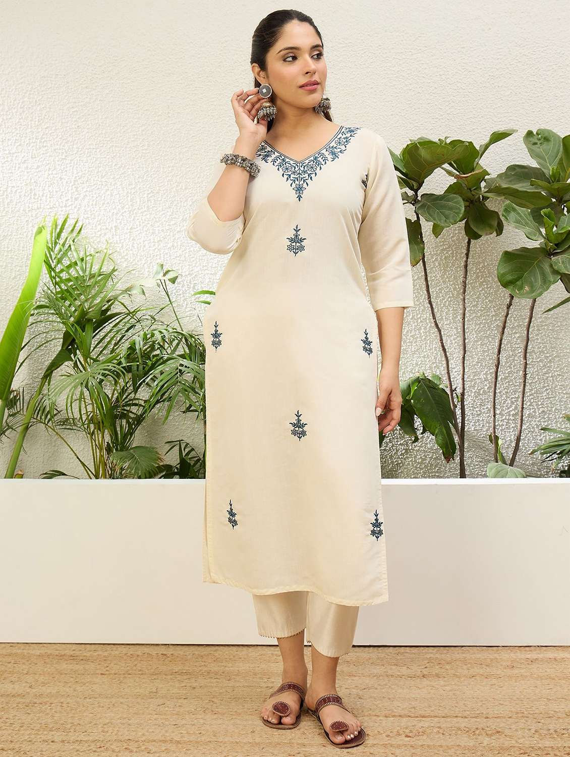 women solid with work three quarter sleeve straight kurta