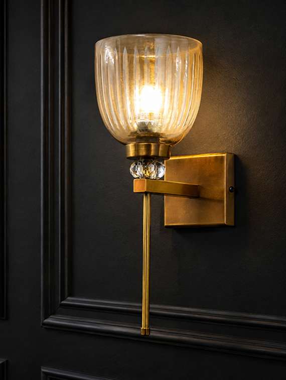 brass finish ribbed glass wall sconce