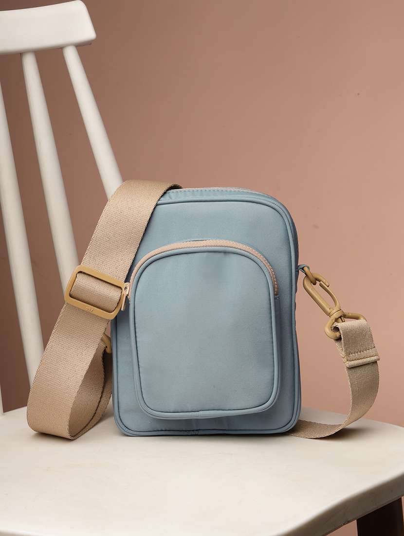 women solid sling bag with adjustable strap