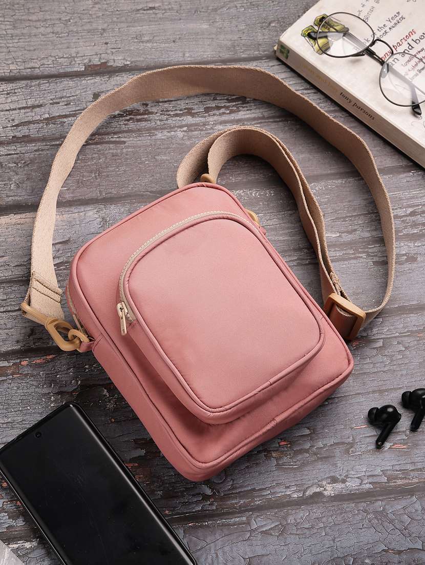 women solid sling bag with adjustable strap