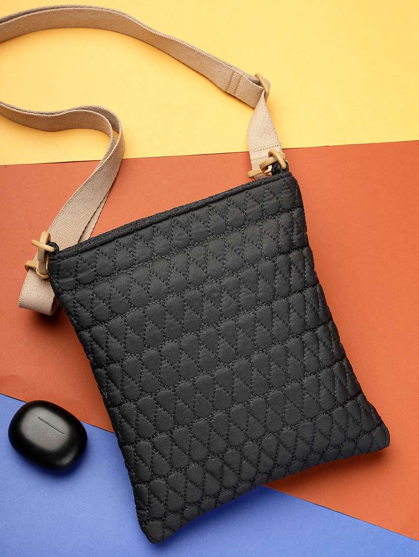 women textured sling bag with adjustable strap