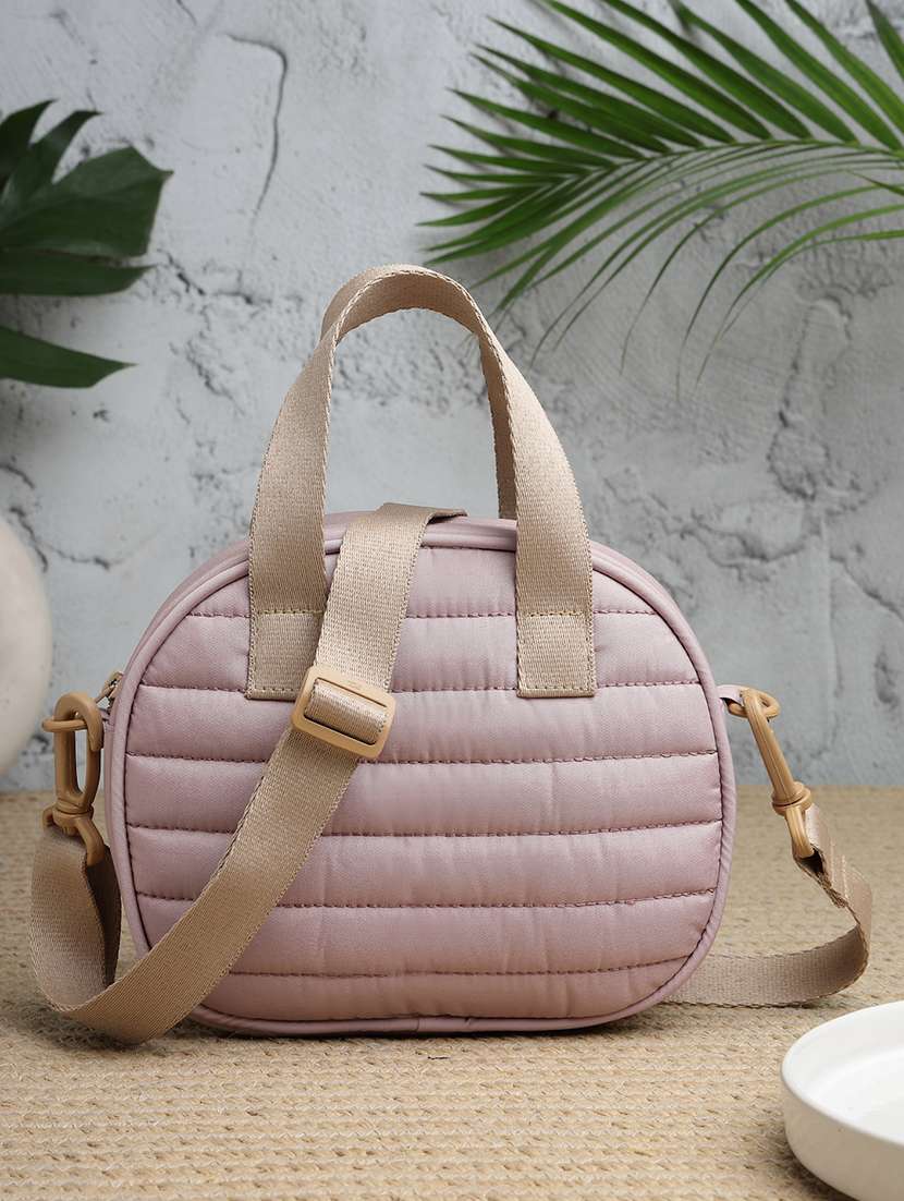 women textured sling bag with adjustable strap