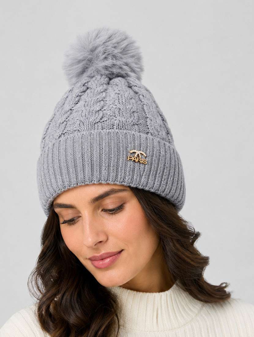 women self design woollen winter cap