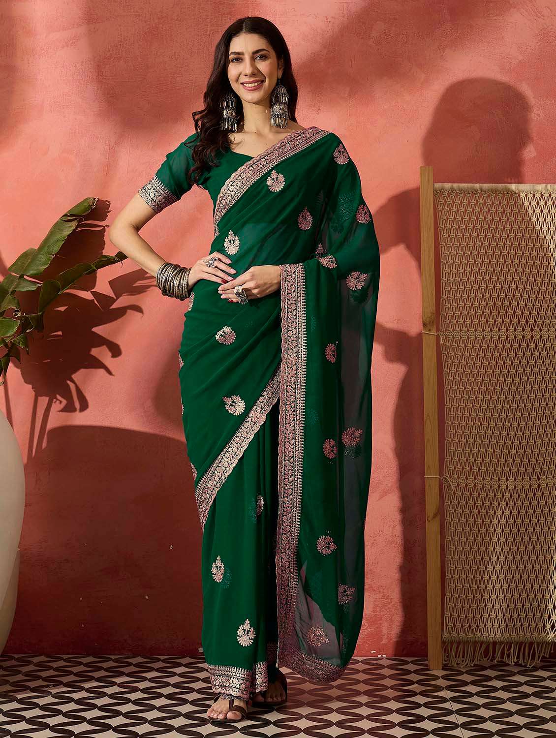 women solid with work embroidered saree with blouse