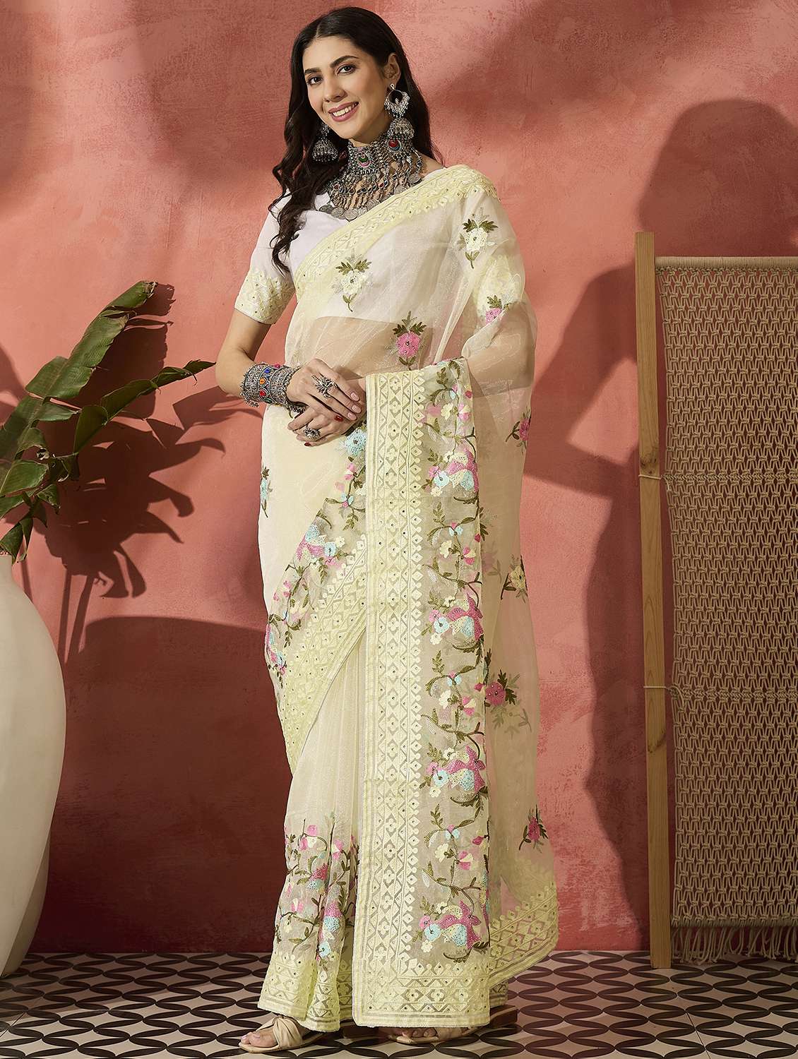 women solid with work embroidered saree with blouse