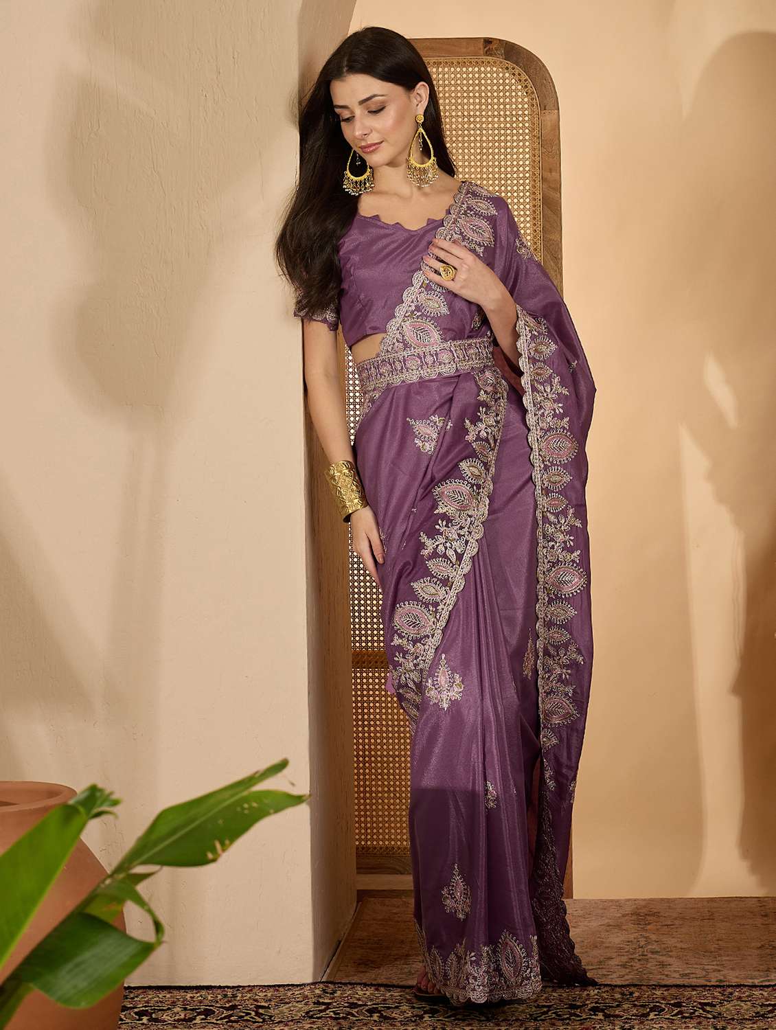 women solid with work embroidered saree with blouse