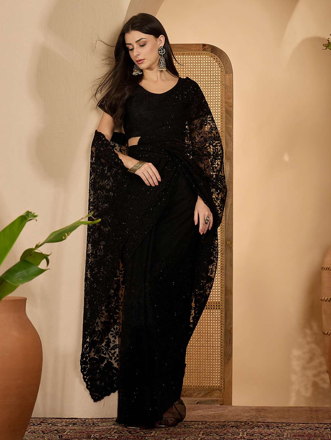 women solid with work embroidered saree with blouse