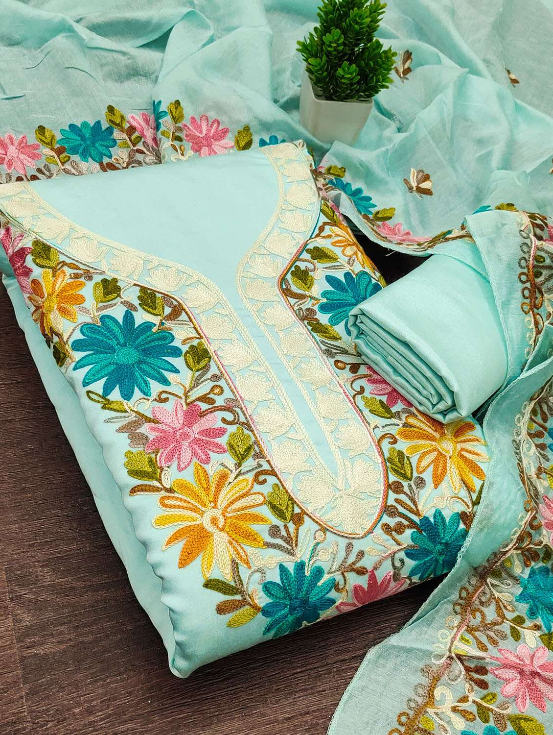 women solid with work unstitched suit set