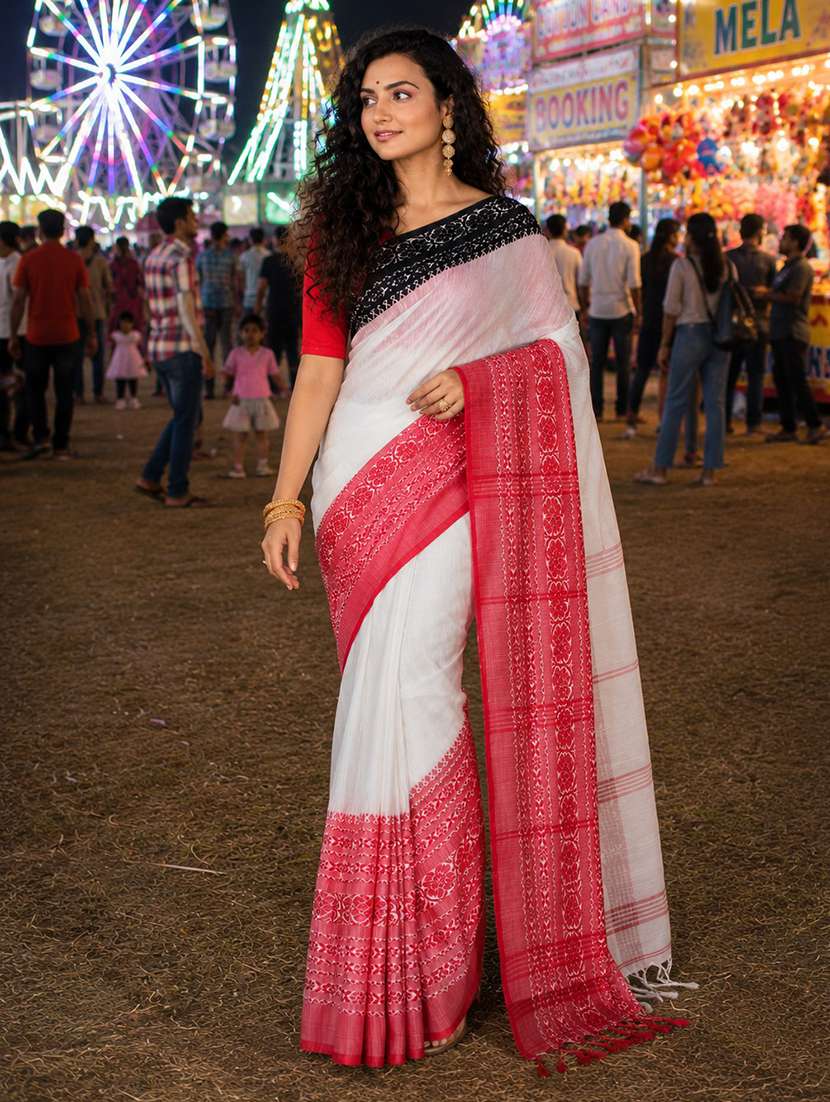women solid with bordered handloom saree with blouse