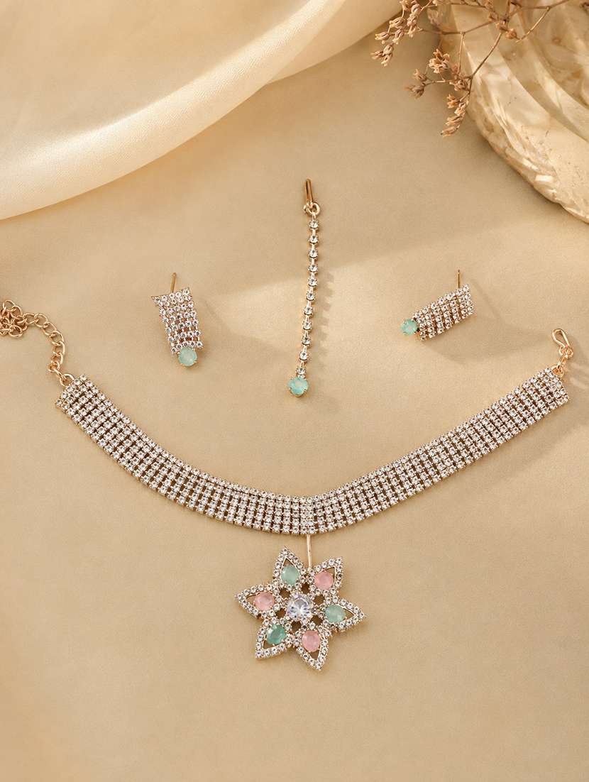 women silver toned jewellery set with earrings and mangtika