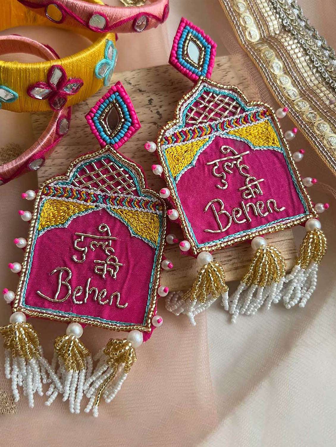 women multi coloured beaded drop earrings