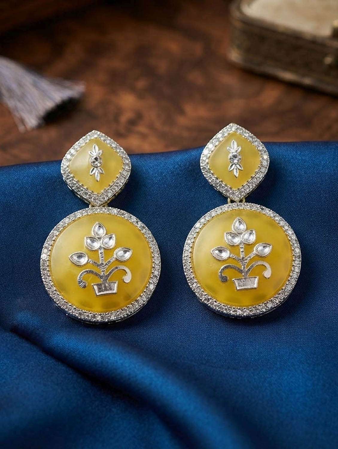 women kundan and stones drop earrings