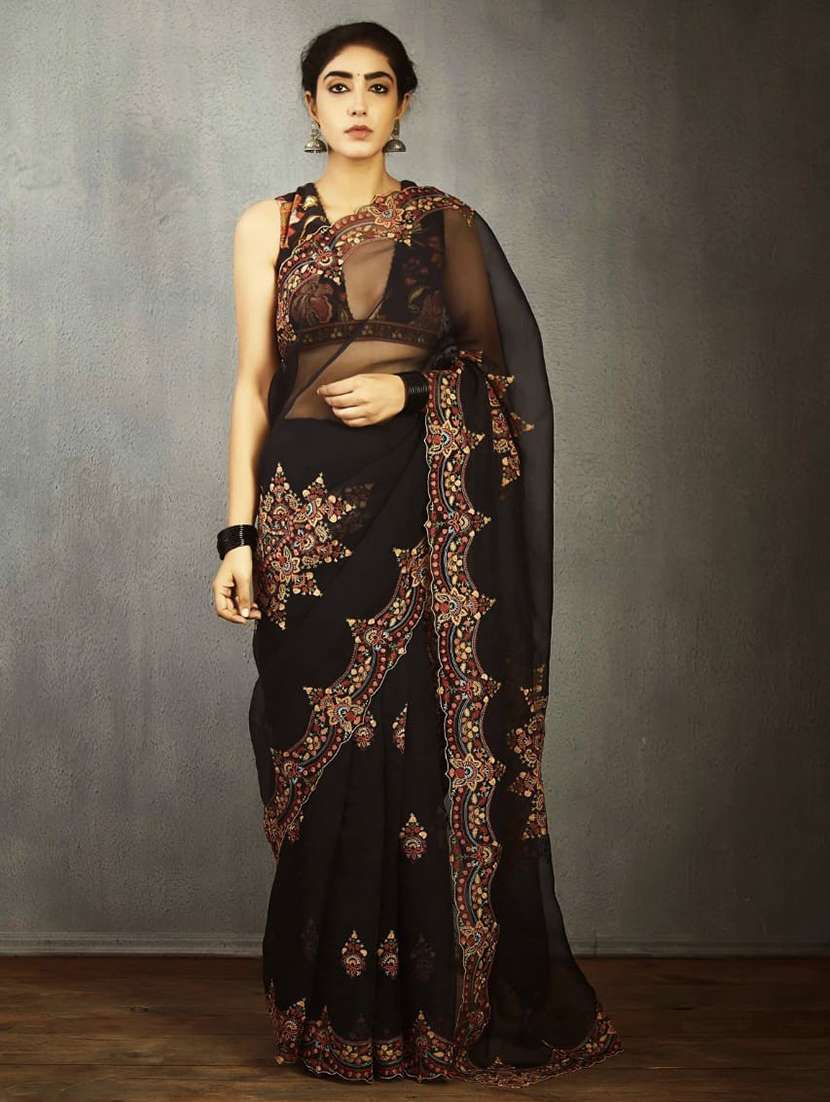 women solid with work embroidered saree with blouse