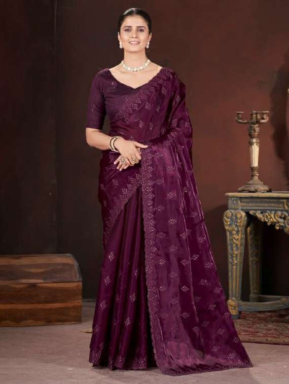 women solid with work embroidered saree with blouse
