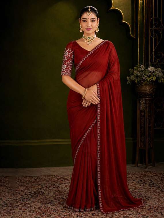 women solid with bordered saree with blouse