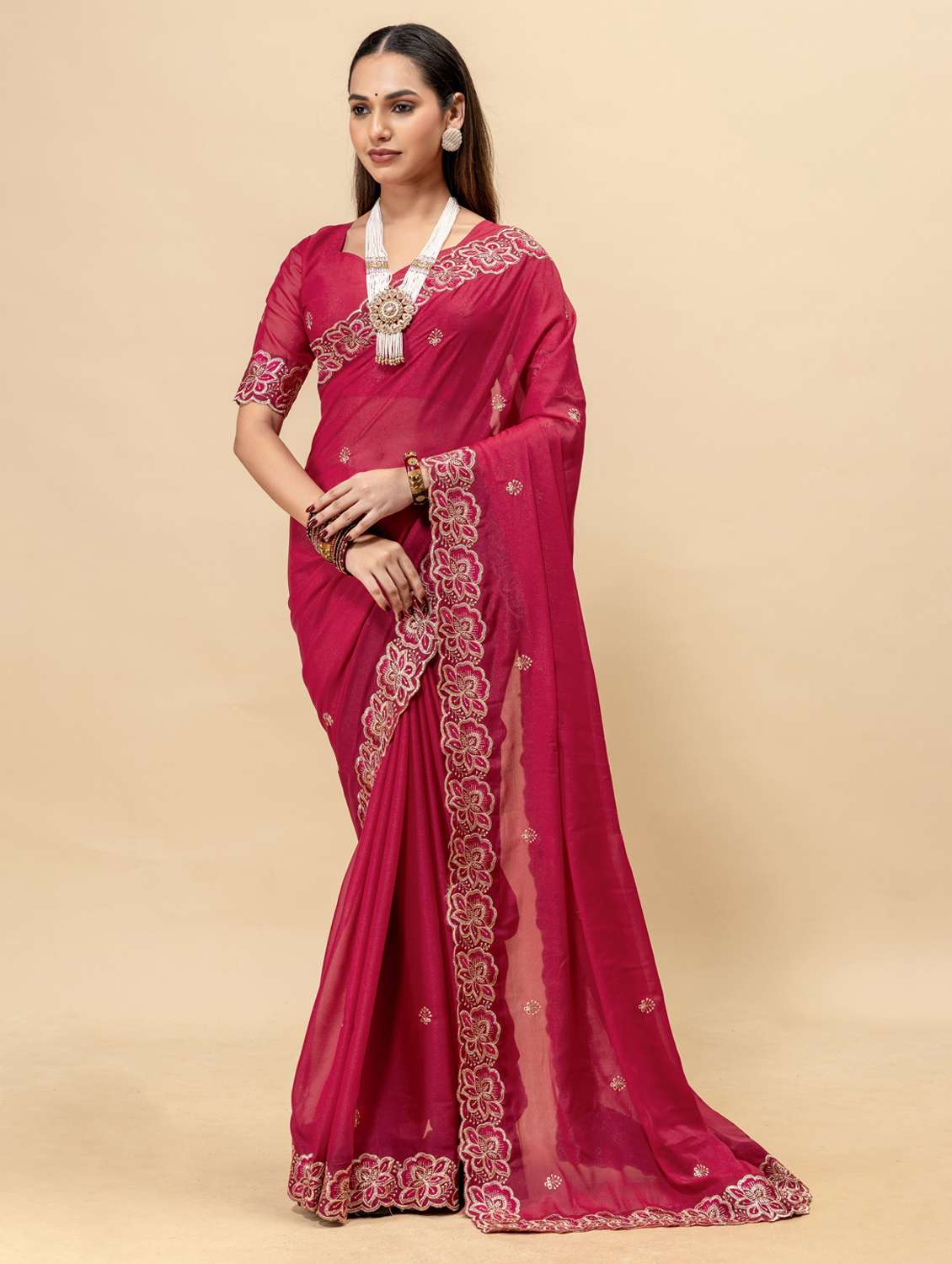 women solid with work embroidered saree with blouse
