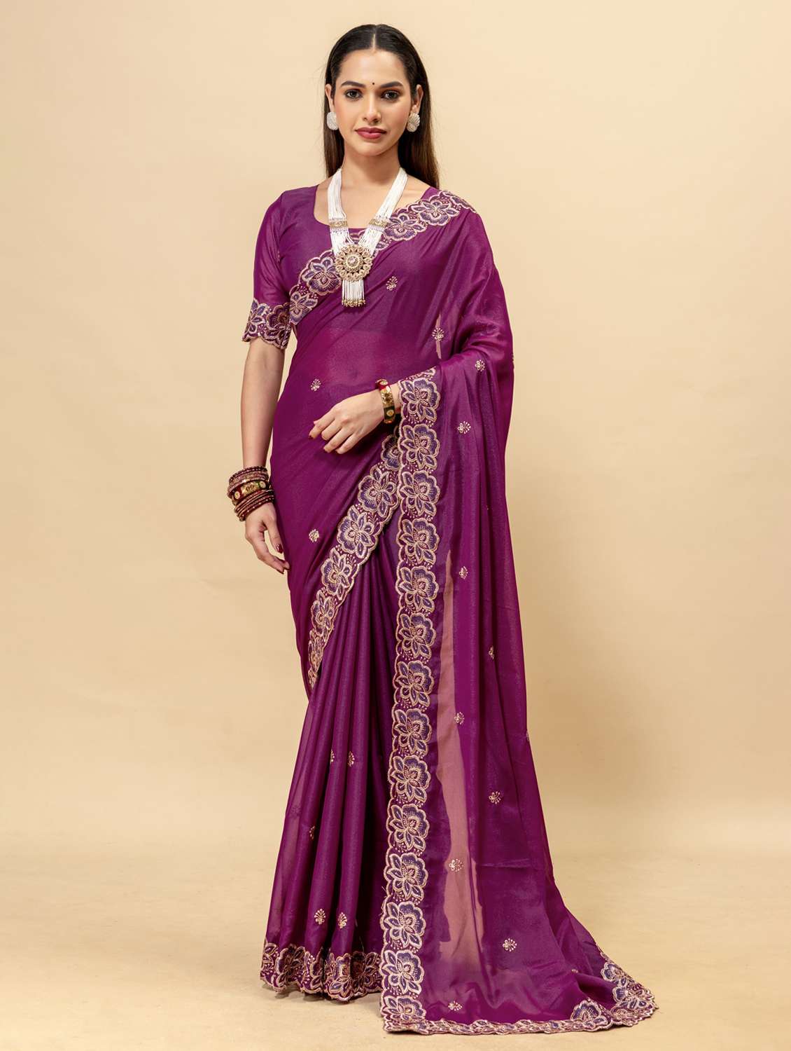 women solid with work embroidered saree with blouse