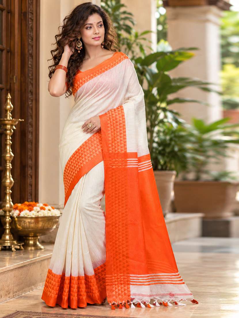 women solid with bordered handloom saree with blouse
